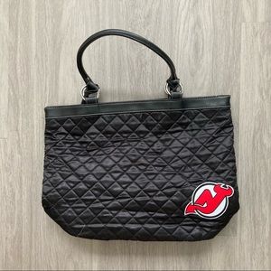 Black New Jersey devils handbag of pleather and cloth